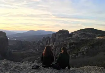 My friend and I sitting by one of the beautiful monasteries at Meteroa. We came at the perfect time to watch the sunset. 