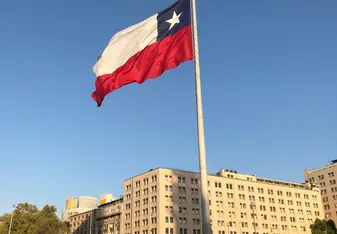 The Chilean flag at La Moneda, the Presidential Palace in Santiago de Chile.