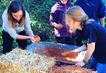 Fun and learning at the clay-cob building school