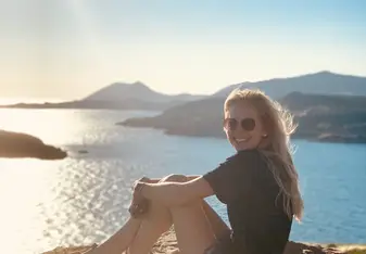 Picture of myself on the cliff by the lake of the temple of Poseidon.