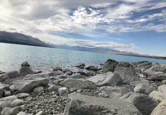 Lake Pukaki; a three hour drive from campus. There is a camping site right along the water with access to public restrooms. 