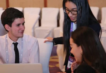 I was able to assist students in various aspects of the summit. Here I was helping a student from Colombia with another ambassador from Peru. 