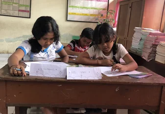 Kids doing some worksheets 