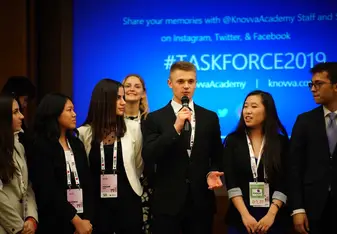 Talking to Y20 conference delegates.