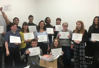 TEFL Graduates Showing their Certificates from London