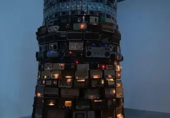 This is a tower built of every kind of radio in the world.
