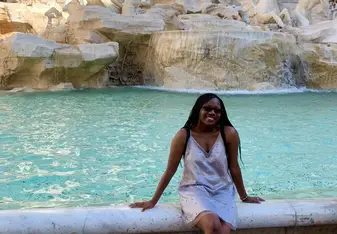 Sitting on The Trevi Fountain
