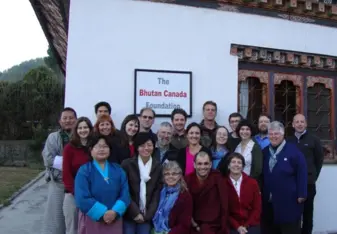 Group of people standing outside Bhutan Canada Foundation office