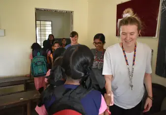 Interacting with a group of year 7 girls after a session of teaching English and Forgiveness.
