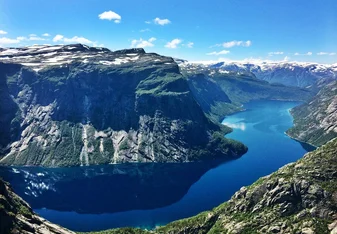 Semester at Sea: Study Around the World A scenic landscape of a deep blue winding river cutting through cliffs.