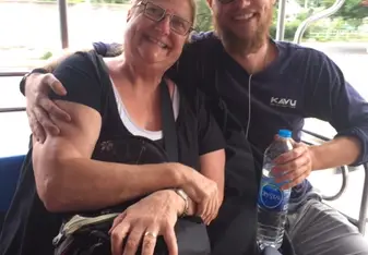 Riding the open air bus to village of Surin, Thailand