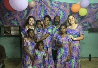 Family photo in our matching Fijian outfits, handmade by our Na.