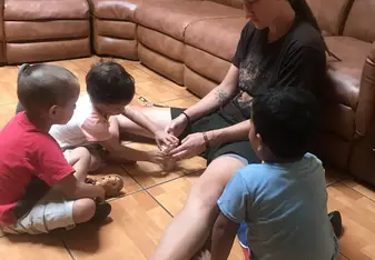 Playing Jenga with the kids at the orphanage