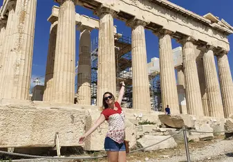 Me in front of the Acropolis after a behind-the-scenes tour with my class!