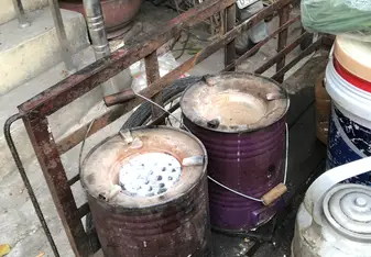 Beehive coal stoves being delivered to local restaurants