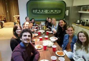 Me, the other residents at The Cape Town Loft and our intern friends sharing a big dinner!