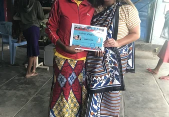 My last day at the shelter being given a conga (what I am wearing) and a certificate of appreciation