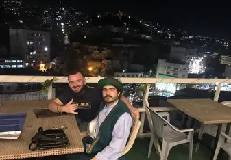 My friend Mohammad Ali and I enjoying some argileh on a rooftop cafe in the city center. You can see the two thousand year old Roman ampitheatre perfectly from here!