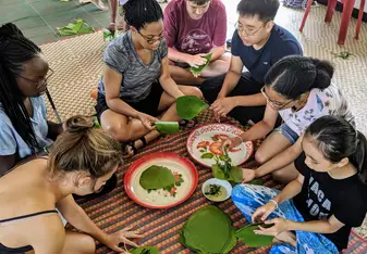 Experimenters making Thai snacks. 