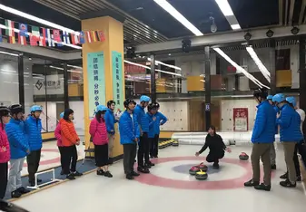 Our class is taught how to play Curling