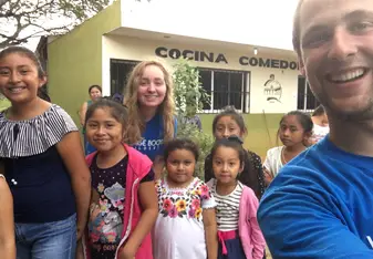 Children waiting to enter and see the library for the first time 