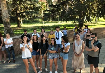This is a picture of my groups host siblings and some friends taken from our departing bus. The girl with her arms crossed is my host sister Encarni who I miss already.