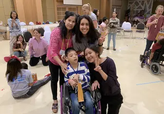 Kaotung, his Grandmom, and physical therapist on our last day of Tykes camp. 