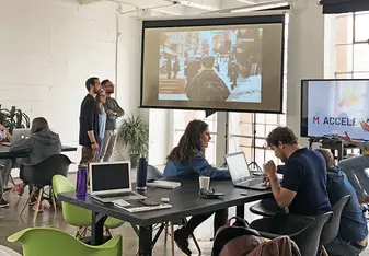 Shot of the classroom in active discussion