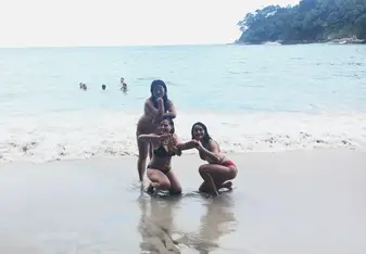 This is a picture of me and my two friends on the beach at Manuel Antonio.