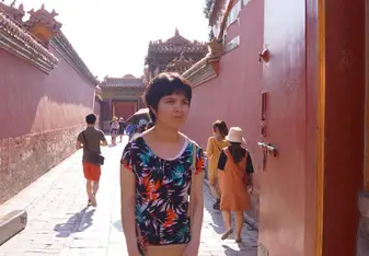 Me standing alone at one of the gates in Forbidden City
