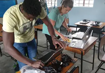 The volunteers setting up the computers