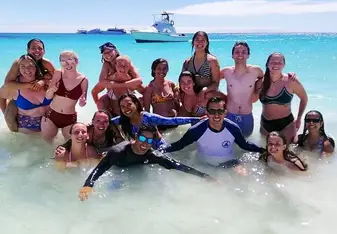 Group picture after diving and snorkeling after Kicker Rock