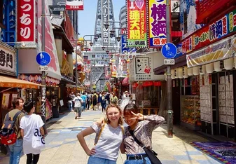 two female students on pedestrian street osaka japan