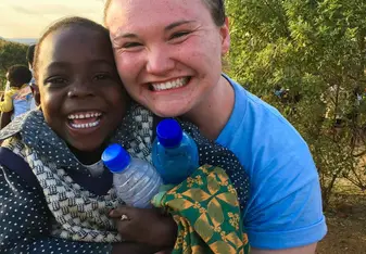Me with just one of the adorable children we taught, played with and read to. 