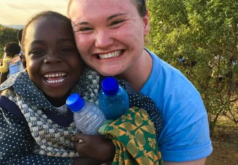 Me with just one of the adorable children we taught, played with and read to. 