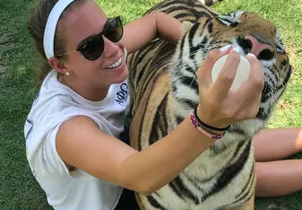 This is from when I was abroad in Thailand and got to feed a tiger cub. 