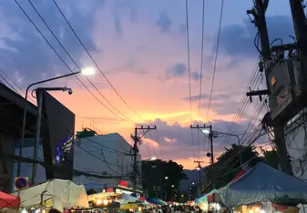 A beautiful sunset during a very crowded Chiang Mai night market.