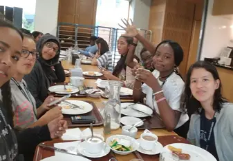 Eating breakfast with my friends.