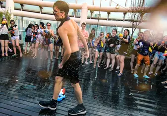 Me dancing in the middle of a dance circle at the Water Gun Festival