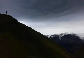A man, a mountain, and a glacier