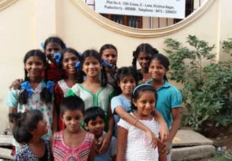 group picture outside Janani Home for Girls