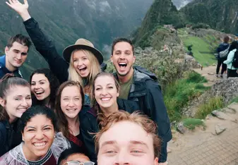 group of people at machu picchu