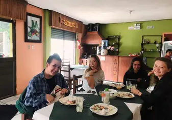 4 girls at lunch in banos, ecuador