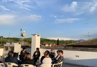 Every evening the group gathers to learn and listen.