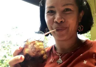 Me drinking a Coca Cola at Victoria's.