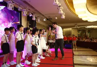 Hosting a talent show for the school