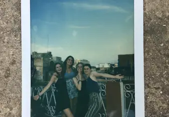 Having a great time with your friends at the rooftop of the hostel