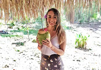Drinking from a coconut 