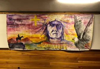 A painting on cloth which a previous volunteer group had completed years earlier.