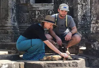 My wife and I giving love to our favorite temple Kitty.